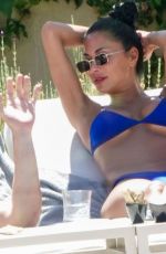 NICOLE SHERZINGER in a Blue Bikini at a Beach in Sardinia 08/10/2023