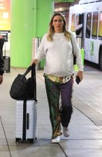 Pregnant CLAIRE HOLT Arrives at LAX Airport 08/21/2023