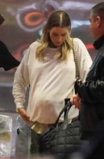 Pregnant CLAIRE HOLT Arrives at LAX Airport 08/21/2023