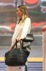Pregnant CLAIRE HOLT Arrives at LAX Airport 08/21/2023
