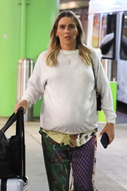 Pregnant CLAIRE HOLT Arrives at LAX Airport 08/21/2023