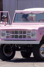 Pregnant KOURTNEY KARDASHIAN and Travis Barker Cruise in Their Barbie-inspired Classic SUV in Calabasas 08/06/2023