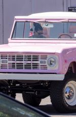 Pregnant KOURTNEY KARDASHIAN and Travis Barker Cruise in Their Barbie-inspired Classic SUV in Calabasas 08/06/2023