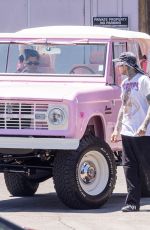 Pregnant KOURTNEY KARDASHIAN and Travis Barker Cruise in Their Barbie-inspired Classic SUV in Calabasas 08/06/2023
