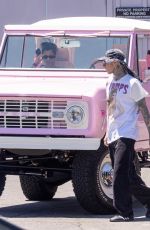 Pregnant KOURTNEY KARDASHIAN and Travis Barker Cruise in Their Barbie-inspired Classic SUV in Calabasas 08/06/2023