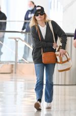 REESE WITHERSPOON at Airport in New York 08/18/2023