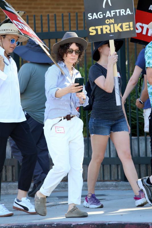 SARA GILBERT and John Goodman Sag Strike at CBS Radford Studios in Studio City 08/18/2023