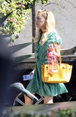 SUTTON STRACKE Headed to Her Fashion Boutique Office 08/01/2023