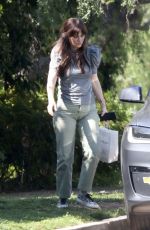 ZOOEY DESCHANEL Arrives at a Friend