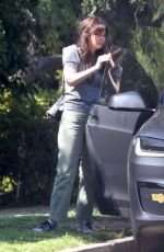 ZOOEY DESCHANEL Arrives at a Friend