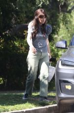 ZOOEY DESCHANEL Arrives at a Friend