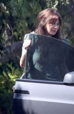 ZOOEY DESCHANEL Arrives at a Friend