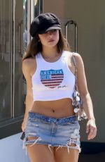 ADDISON RAE in Ripped Denim Skirt Out for Lunch at All Time in Los Feliz 09/29/2023