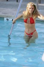 ANNALYNNE MCCORD in a Red Bikini at Hotel Pool in Los Angeles 09/27/2023