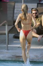 ANNALYNNE MCCORD in a Red Bikini at Hotel Pool in Los Angeles 09/27/2023