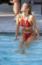 ANNALYNNE MCCORD in a Red Bikini at Hotel Pool in Los Angeles 09/27/2023