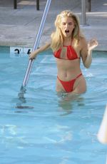 ANNALYNNE MCCORD in a Red Bikini at Hotel Pool in Los Angeles 09/27/2023