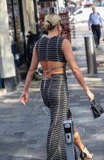 ASHLEY ROBERTS Arrives at Heart Radio in London 09/05/2023