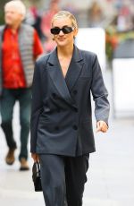 ASHLEY ROBERTS Arrives at Heart Radio in London 09/21/2023