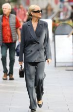 ASHLEY ROBERTS Arrives at Heart Radio in London 09/21/2023