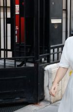AURORE BERGE Arrives at Restos du Coeur Charity Organization Headquarters in Paris 09/05/2023