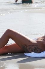 CHLOE FERRY in a White Bikini on the Beach in Spain 09/06/2023