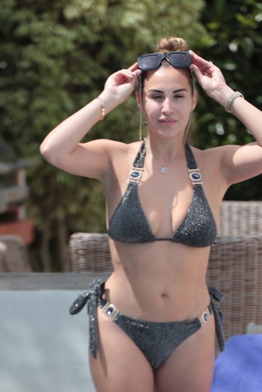 CHLOE GOODMAN in Bikini on Holiday in Spain 09/03/2023