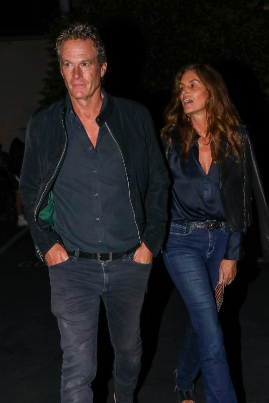 CINDY CRAWFORD and Rande Gerber Night Out in Malibu 09/22/2023