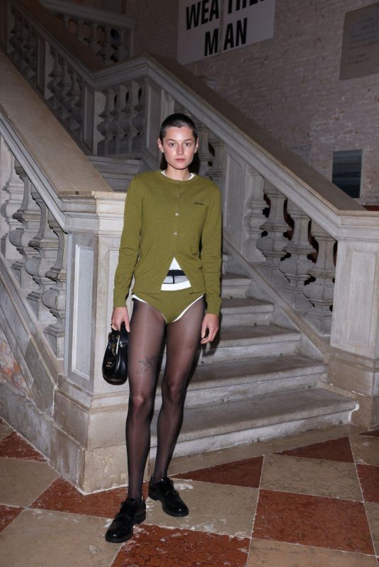 EMMA CORRIN Arrives at Miumiu Women