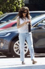 EMMY ROSSUM Heading to Starbucks in Los Angeles 08/09/2023