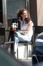EMMY ROSSUM Heading to Starbucks in Los Angeles 08/09/2023