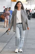 EMMY ROSSUM Out with her Dog at JFK Airport in New York 09/06/2023