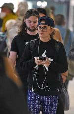 G FLIP Arrives at Airport in Melbourne 09/06/2023