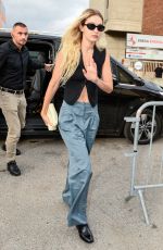 GIGI HADID Arrives at Versace Building in Milan 09/21/2023