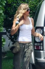 GISELE BUNDCHEN Brings Her German Shepherd to Her New Home in Miami 08/01/2023