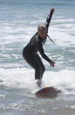 JOJO SIWA in Wetsuit Out Surfing with Her Dad in Malibu 09/07/2023