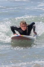 JOJO SIWA in Wetsuit Out Surfing with Her Dad in Malibu 09/07/2023