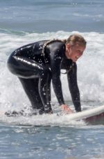 JOJO SIWA in Wetsuit Out Surfing with Her Dad in Malibu 09/07/2023