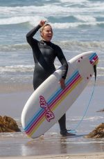JOJO SIWA in Wetsuit Out Surfing with Her Dad in Malibu 09/07/2023