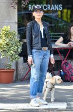 JULIANNA MARGULIES Out with Her Dog in New York 09/21/2023