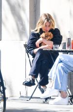 JULIANNE HOUGH Out with Her New Puppy in New York 09/21/2023