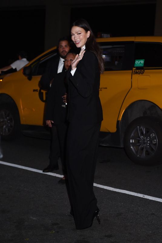 KARLIE KLOSS Arrives at Kering Foundation