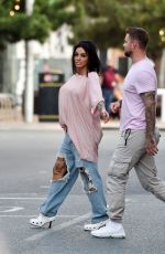 KATIE PRICE Climbs onto a Vivid Pink Car Outside Neighbourhood Restaurant in Liverpool 09/04/2023