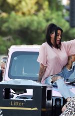 KATIE PRICE Climbs onto a Vivid Pink Car Outside Neighbourhood Restaurant in Liverpool 09/04/2023