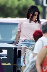 KATIE PRICE Climbs onto a Vivid Pink Car Outside Neighbourhood Restaurant in Liverpool 09/04/2023