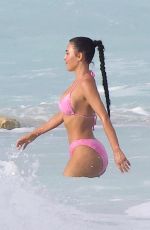 KIM KARDASHIAN in Bikini at a Beach in Turks and Caicos 09/08/2023