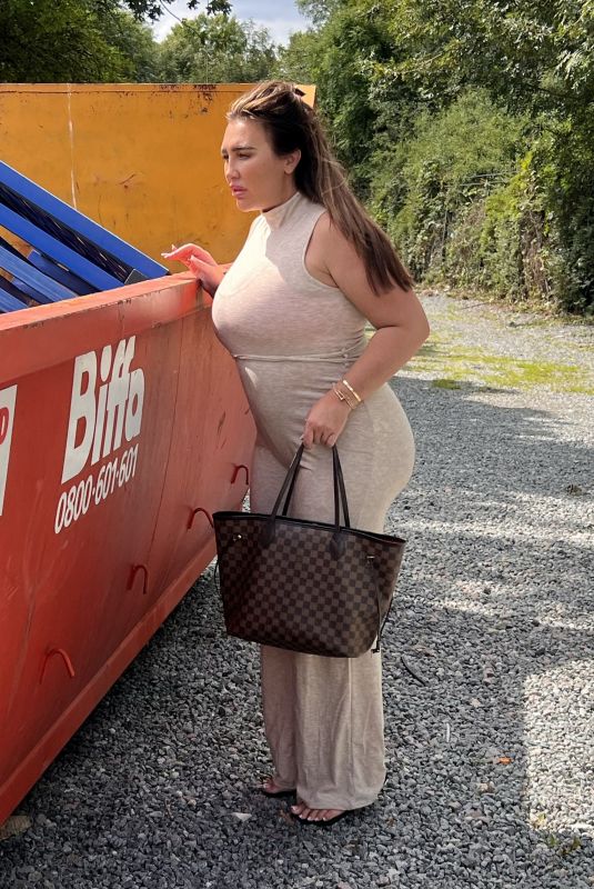 LAUREN GOODGER Looking for Something in a Skip Near Her House 09/10/2023