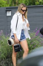 MARGOT ROBBIE in Denim Shorts Out Shopping in Beverly Hills 09/09/2023