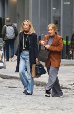 MARIA BELLO Enjoys a Cigarette After Shopping with Her Friend in New York 09/27/2023