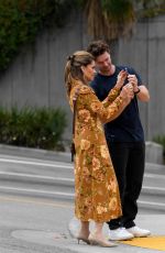 MARIA SHRIVER Photographs Patrick Schwarzenegger Under a Billboard for Their MOSH Products 09/21/2023